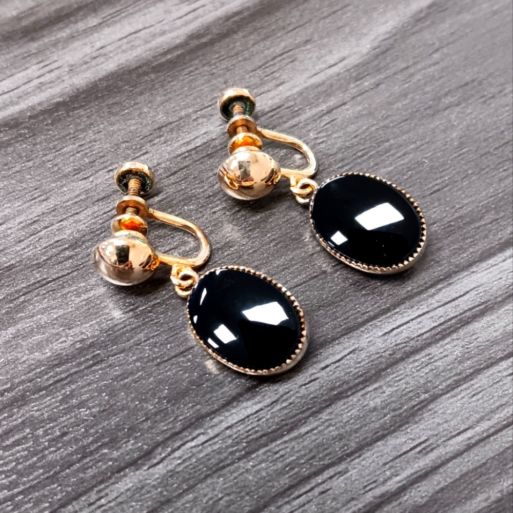 Gold and onyx earings signed Amos